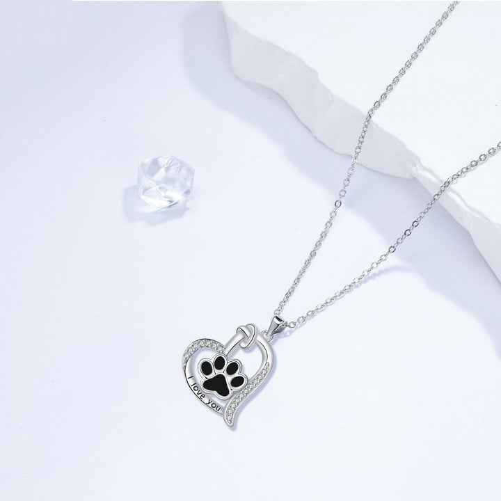 Heart-shaped dog paw print necklace with zirconia