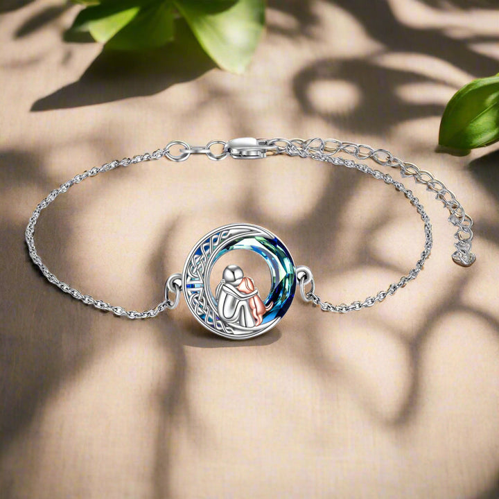 Adjustable bracelet with a dog-shaped charm in sterling silver